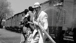 Watch the movie clip "Watering Trains" from "Schindler's List"