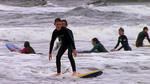 Watch the movie clip "Surfing Together" from "Step Into Liquid"